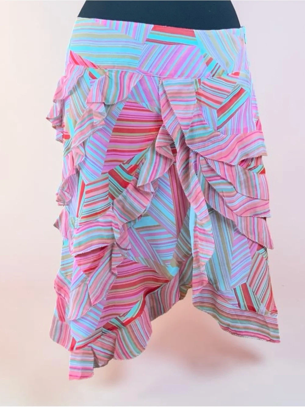 Striped Pink Turquoise Ruffle Asymmetrical Midi Skirt very flattering.